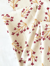 Normandy II Branches Napkin in Garnet & Gold | Hedgehouse