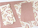 Normandy II Branches Napkin in Garnet & Gold | Hedgehouse
